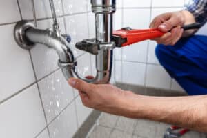 Man repairing sink